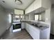 Functional kitchen featuring modern appliances, granite countertops, and streamlined cabinetry at 3114 Adams St, Indianapolis, IN 46218