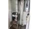 Utility room featuring the furnace, hot water heater and breaker panel at 3114 Adams St, Indianapolis, IN 46218