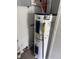 A standard hot water heater located in the utility area of the home at 3114 Adams St, Indianapolis, IN 46218