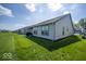 Expansive backyard featuring a covered patio, and a green lawn at 345 Ehrlich Ln, Westfield, IN 46074