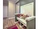 Entryway featuring a built-in bench with decorative pillows and wood-style flooring at 345 Ehrlich Ln, Westfield, IN 46074