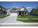 Well-maintained home featuring a lawn, attached garage, and neat landscaping at 345 Ehrlich Ln, Westfield, IN 46074