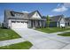 Attractive home with a manicured lawn, two car garage, and concrete driveway at 345 Ehrlich Ln, Westfield, IN 46074