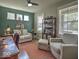 Cozy home office with natural light, built-in shelving, and neutral decor at 345 Ehrlich Ln, Westfield, IN 46074