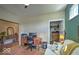 Functional home office with desk, closet, and comfortable seating area at 345 Ehrlich Ln, Westfield, IN 46074