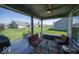 Relaxing covered patio with outdoor furniture, ceiling fan, and views of the backyard at 345 Ehrlich Ln, Westfield, IN 46074