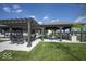 Elegant pergolas with comfortable seating and a built-in grill, ideal for outdoor gatherings and relaxation at 345 Ehrlich Ln, Westfield, IN 46074
