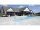Community pool featuring lounge area, with clear blue water and modern architecture creating a relaxing neighborhood retreat at 345 Ehrlich Ln, Westfield, IN 46074