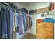 Spacious walk-in closet with built-in shelves, racks, drawers, and ample storage space for clothing and accessories at 345 Ehrlich Ln, Westfield, IN 46074