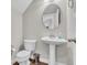 A half bathroom with a pedestal sink and a toilet at 3546 Brampton Ln, Westfield, IN 46074