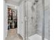 Bathroom featuring a glass enclosed shower, walk in closet and neutral colors at 3546 Brampton Ln, Westfield, IN 46074