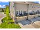 Charming townhome with private balconies and an attached garage, surrounded by a well-manicured lawn at 3546 Brampton Ln, Westfield, IN 46074