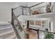 Lofted landing showcases basement pool table and staircase at 3546 Brampton Ln, Westfield, IN 46074