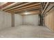 Expansive unfinished basement space showing concrete walls and floor, along with exposed ceiling beams and utilities at 4078 Besbie Way, Bargersville, IN 46106