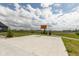 A spacious outdoor basketball court provides recreational space and entertainment on the property at 4078 Besbie Way, Bargersville, IN 46106