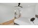 Bedroom featuring a ceiling fan, neutral tones, and an ensuite bath at 4078 Besbie Way, Bargersville, IN 46106