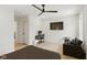 Bedroom featuring a ceiling fan, sleek modern decor, and functional workspace at 4078 Besbie Way, Bargersville, IN 46106