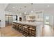 Gourmet kitchen featuring a large island with bar seating, pendant lighting, and stainless steel appliances at 4078 Besbie Way, Bargersville, IN 46106