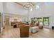Open-concept design seamlessly connecting the living room with the kitchen and outdoor pool area at 4078 Besbie Way, Bargersville, IN 46106