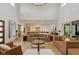 Elegant living room with an open concept, seamlessly connecting to a gourmet kitchen and outdoor living spaces at 4078 Besbie Way, Bargersville, IN 46106
