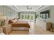 Spacious main bedroom with tray ceiling and french doors with outdoor access at 4078 Besbie Way, Bargersville, IN 46106