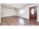 Inviting living room with beautiful flooring, a ceiling fan and ample natural light at 423 W Janet Dr, Brownsburg, IN 46112