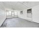 Relaxing enclosed sunroom with ample natural light and access to the backyard at 423 W Janet Dr, Brownsburg, IN 46112