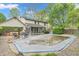 Backyard with a pool, a screened-in porch, and mature trees, creating a serene outdoor retreat at 4232 Briarwood Dr, Indianapolis, IN 46250