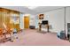 Basement with carpet flooring, ideal for recreation or storage, featuring an entertainment setup at 4232 Briarwood Dr, Indianapolis, IN 46250