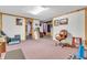Spacious basement featuring carpet flooring and wood trim, creating a versatile living area at 4232 Briarwood Dr, Indianapolis, IN 46250