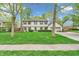 Two-story home featuring a well-kept lawn and a classic exterior design at 4232 Briarwood Dr, Indianapolis, IN 46250