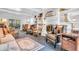 Cozy living room with a white brick fireplace, built-in shelves, and comfortable seating at 4232 Briarwood Dr, Indianapolis, IN 46250