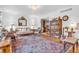 Bright living room with hardwood floors, neutral decor, and a comfortable seating arrangement at 4232 Briarwood Dr, Indianapolis, IN 46250