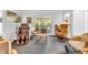 Relaxing sitting area with comfortable chairs, an area rug, and access to the outdoors at 4232 Briarwood Dr, Indianapolis, IN 46250