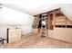 Attic space in progress, featuring exposed framing and unfinished walls at 4302 Kessler Blvd N Dr, Indianapolis, IN 46220