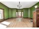 Spacious living room features refinished hardwood floors, new paint, and bay window at 4302 Kessler Blvd N Dr, Indianapolis, IN 46220