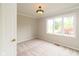 Comfortable bedroom with a large window and neutral colors at 4351 W Fox Ridge Ave, Greenwood, IN 46143