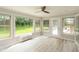 Inviting sun room featuring abundant natural light and a door to the outdoor space at 4351 W Fox Ridge Ave, Greenwood, IN 46143