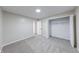 Bedroom featuring carpet flooring and a walk in closet and fresh neutral paint at 444 Buffalo Dr, Indianapolis, IN 46217