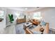 Inviting living area featuring modern décor, stylish furniture, new flooring, and ample natural light at 444 Buffalo Dr, Indianapolis, IN 46217