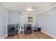 Functional laundry room with modern washer and dryer and wood-look flooring at 4716 E 33Rd St, Indianapolis, IN 46218