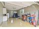 Spacious three car garage with extra storage and epoxy floors at 4732 Ferguson Rd, Indianapolis, IN 46239