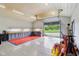 Open garage with work bench and outdoor view provides a versatile space for projects and storage at 4732 Ferguson Rd, Indianapolis, IN 46239