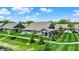 Scenic aerial view of a residential home showcasing a well-manicured lawn, landscaping, and neighborhood layout at 4965 Eldon Dr, Noblesville, IN 46062