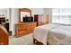 Bedroom with natural wood furniture, neutral carpet and large windows with blinds at 4965 Eldon Dr, Noblesville, IN 46062