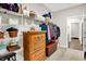 Walk-in closet featuring organized shelving and a built-in wooden dresser at 4965 Eldon Dr, Noblesville, IN 46062