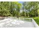 Enjoy the outdoors on this spacious back deck with white railings and stairs at 5015 E 70Th E St, Indianapolis, IN 46220