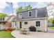 Well-maintained backyard with a patio, grill, outdoor seating, and stylish design at 5224 Boulevard Pl, Indianapolis, IN 46208