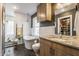 Bright bathroom featuring a soaking tub, marble countertop, and modern fixtures at 5224 Boulevard Pl, Indianapolis, IN 46208