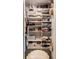 Organized walk-in closet featuring shelving and storage solutions for clothing and accessories at 5224 Boulevard Pl, Indianapolis, IN 46208